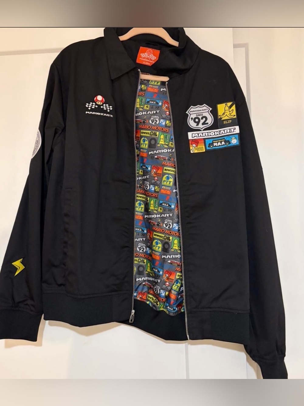 Nintendo Black Bomber Jacket with Colorful Mario Kart Lining